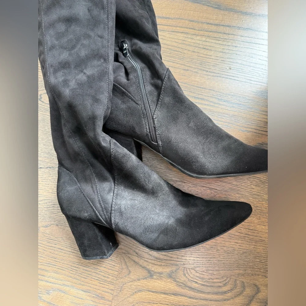 Marc Fisher black faux suede over-the-knee boots with a block heel and tie-back.